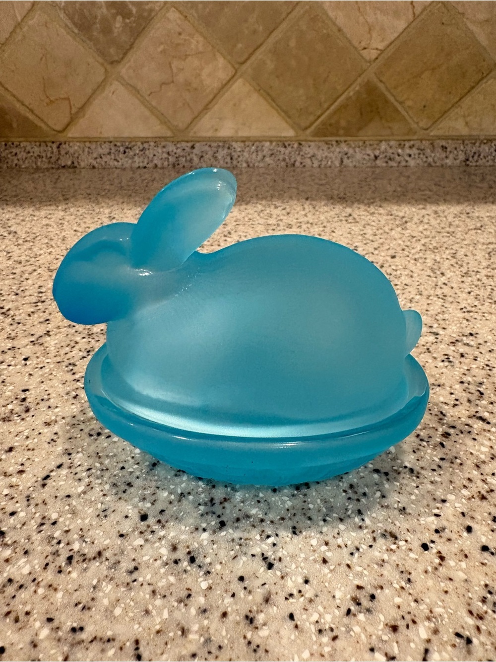 Frosted glass rabbit on a nest candy